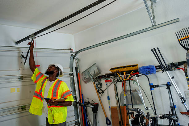 Professional Garage Door Panel Replacement technician working in Leland Grove, IL